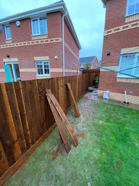 New close-board fence going up alongside the side path