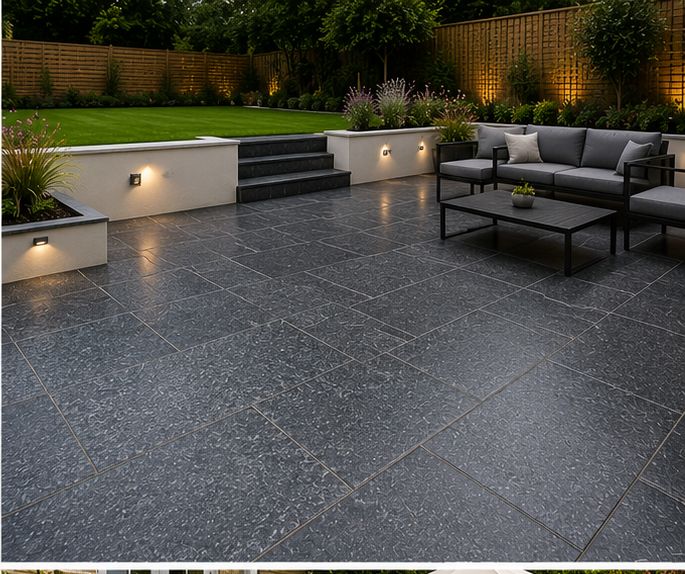 Dark granite patio with low wall lights